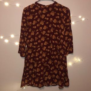 Burgundy-red swing dress w/floral pattern